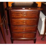 A Stag Minstrel bedside chest of four long drawers, width 52.5cm