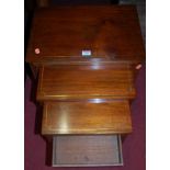 A 20th century mahogany and brass inlaid nest of three occasional tables, the largest 46 x 31cm