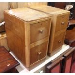 A pair of 1930's light oak bedside chests, w.32cmCondition report: Height 61cm, depth 48cm