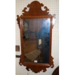 A Chippendale style mahogany fret carved wall mirror, 79.5 x 41.5cm