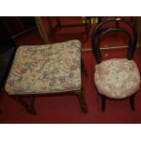 An early 20th century oak barleytwist turned dressing stool; together with a small cane foot