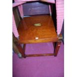 A contemporary mahogany and brass bound campaign style low square occasional table, width 61cm