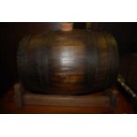 A 20th century coopered oak barrel on stand, h.34cmCondition report: Very good condition with some