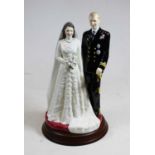 A Royal Doulton figure 'HM The Queen & HRH Duke of Edinburgh', HN3836, h.25cmCondition report: No