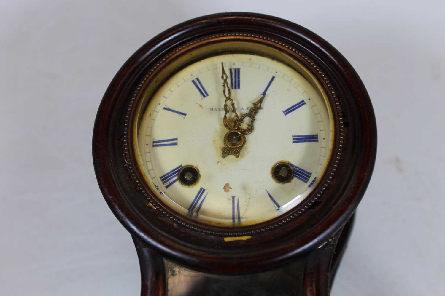 Malecot of Paris, a faux rosewood cased balloon shaped bracket clock having signed white enamel - Image 2 of 4