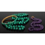 A beaded and knotted malachite single string necklace, 78cm; together with a malachite on brass