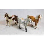 A Beswick Pinto pony, model No.1373, first version, Skewbald, gloss finish; together with a