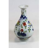 A Chinese export porcelain vase, having a flared rim to a slender neck and bulbous lower body,