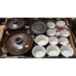 A box of sundry Denby stoneware dinnerwares, to include two Denby stoneware casserol dishes and