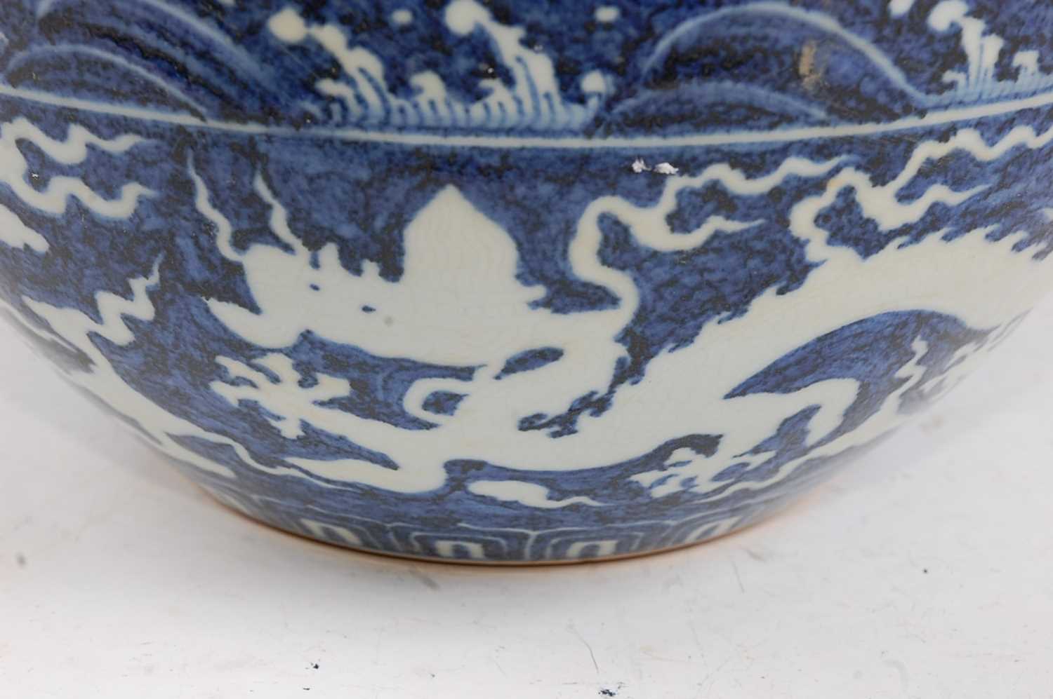 A Chinese export stoneware bowl having a plain blue interior, the exterior decorated with a five - Image 4 of 4