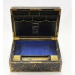 A Victorian black leather clad writing box, the hinged lid opening to reveal a fitted interior