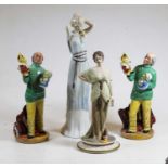 A Royal Doulton figure 'Punch and Judy Man' 23cm high, together with another, a Capo di Monte figure
