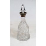 A 20th century cut glass decanter and stopper, having a silver collar, h.32cm