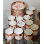A set of twelve Royal Crown Derby coffee cans and saucers, in the Imari pattern, No.2712