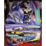 Three boxed Scalextric sets to include A1 Grand Prix, Subaru Rally and Starsky & Hutch