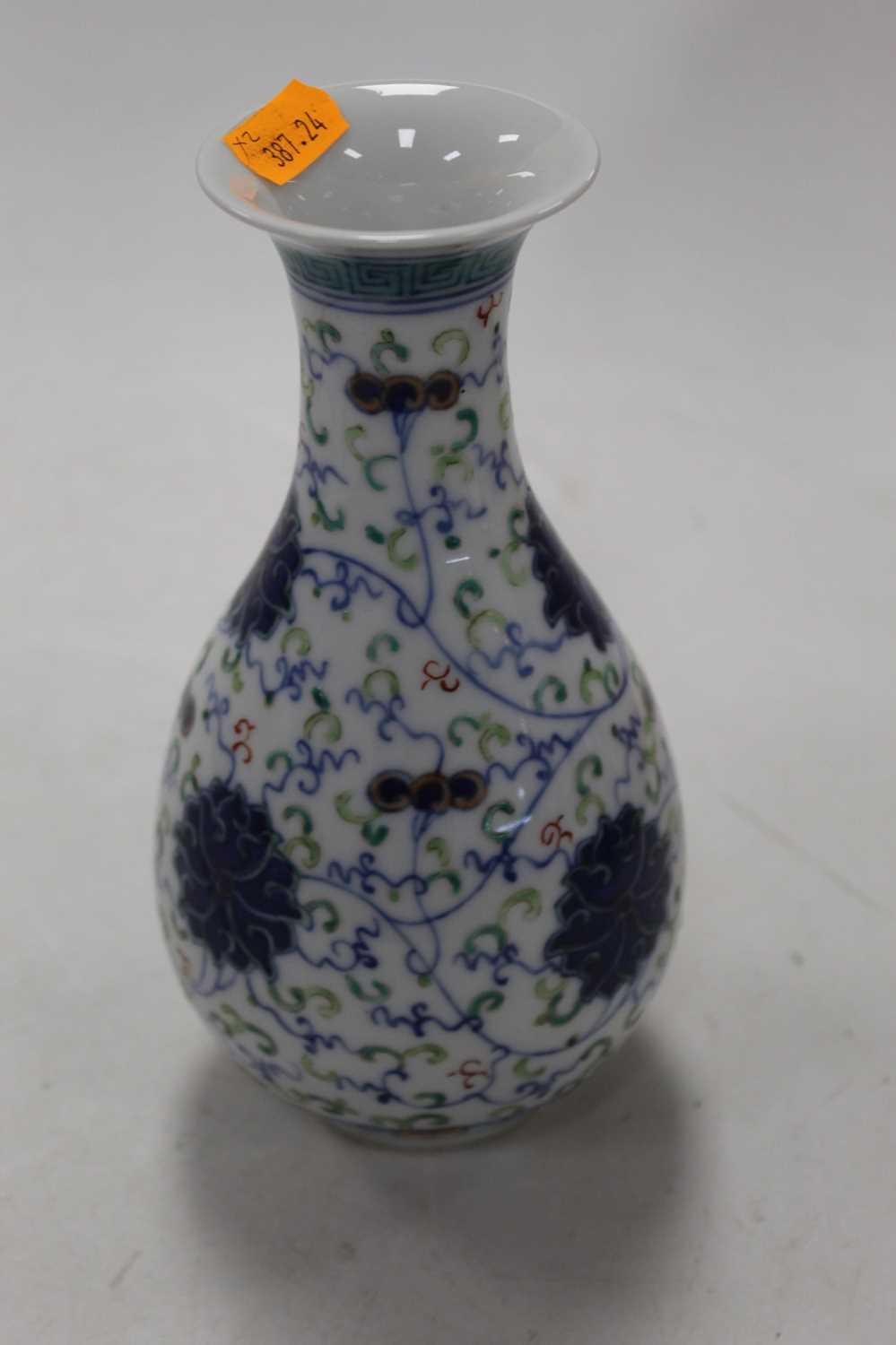 A Chinese export blue & white bottle vase of typical form decorated with mythical figures within - Image 9 of 11