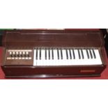 A Magnus electric chord organ