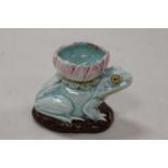 A Victorian majolica vase in the form of a frog with a lily upon its back, impressed RD171772,