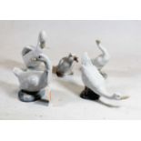 A Lladro figure of a goose, having printed mark verso, h.12cm; together with four Nao geese (5)