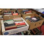 Five boxes containing a collection of books relating to opera and classical music