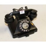 A black bakelite cased GPO telephone