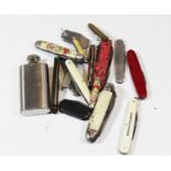A small collection of 19th century and later pocket knives; together with a stainless steel hip