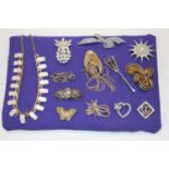 A collection of miscellaneous costume jewellery to include paste set brooches, earrings, etc