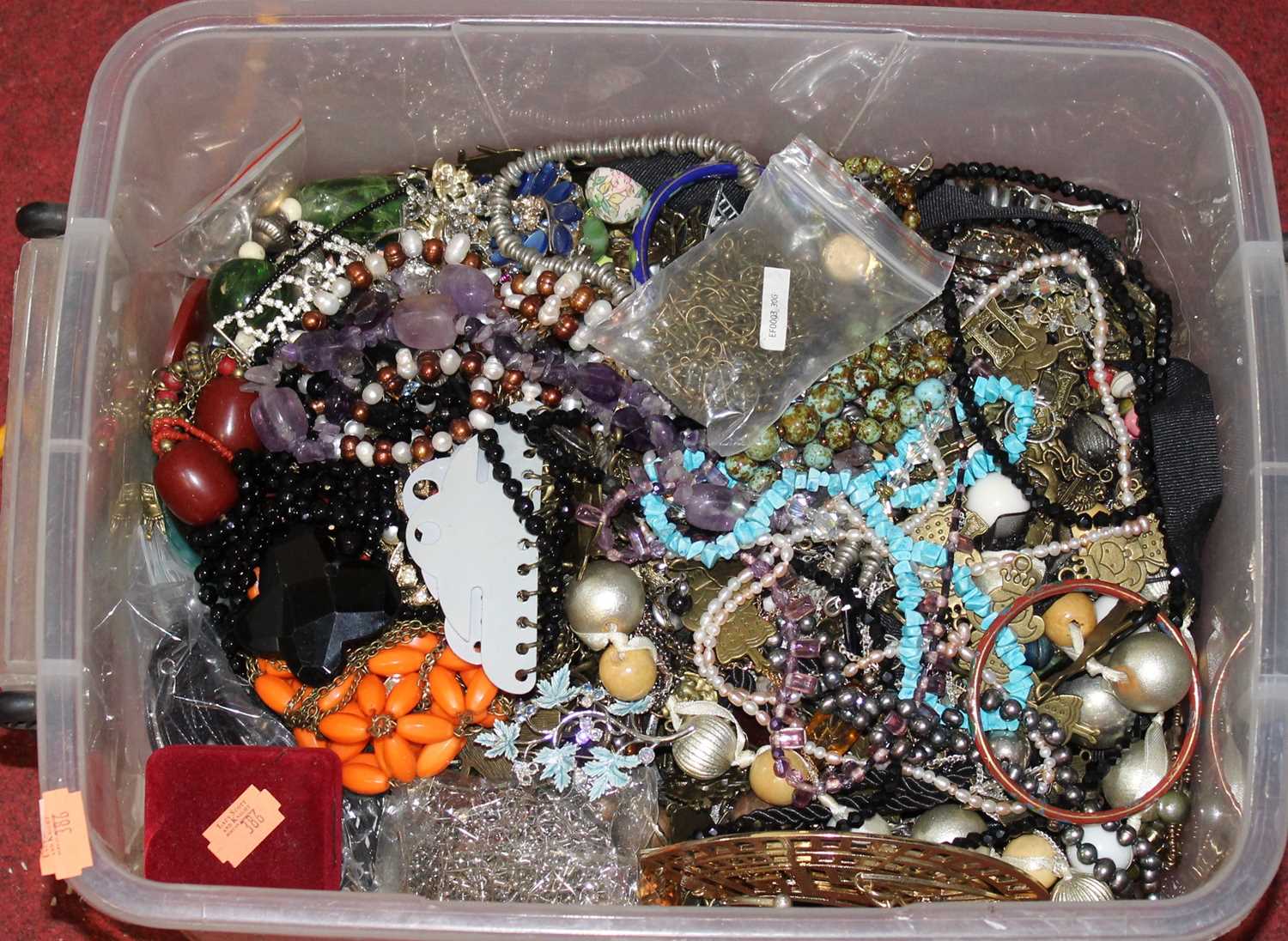 A large collection of miscellaneous costume jewellery to include quartz necklace, beaded