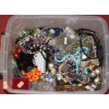 A large collection of miscellaneous costume jewellery to include quartz necklace, beaded