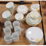 A Crown Staffordshire part tea service in the St James' Square pattern (lacking teapot); together