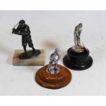 An Art Deco style spelter model of a golfer in full swing, on an onyx base, h.15cm; together with