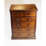 A Victorian mahogany and box wood strung apprentice chest, containing two short over four long