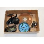 A T.J.H. & Son Triple Check fly fishing reel together with two other centrepin reels, a fixed