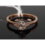 A 9ct gold diamond solitaire ring, the claw set old cut diamond weighing approx 0.3 carats, 2.2g,