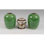 A pair of Chinese green crackle glazed vases each of ovoid form, height 17cm, together with one