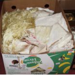 A box of miscellaneous lace and linen, to include embroidered tablecloth, curtain ties etc