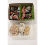 Two boxes of various polished hard stones, fossils and shells
