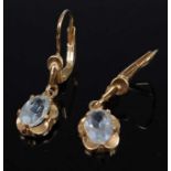 A pair of 9ct gold and white sapphire(?) set ear pendants, on shepherd's crook fittings, 2.2g,