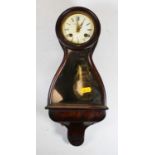 Malecot of Paris, a faux rosewood cased balloon shaped bracket clock having signed white enamel