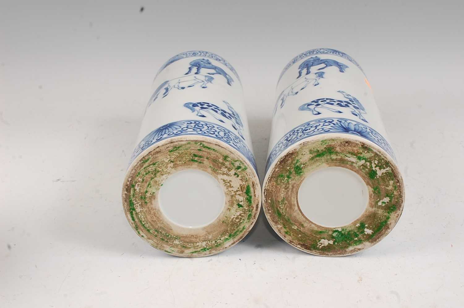 A pair of Chinese blue & white vases each of cylindrical form decorated with various horses within - Image 5 of 5