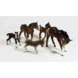 A collection of three various Beswick foals; together with a Beswick donkey; and another foal (5)