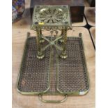 A 19th century pierced brass trivet standing on four spiral turned legs, height 25cm; together