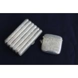 An Edwardian silver cheroot case having foliate engraved decoration, initialled cartouche, and