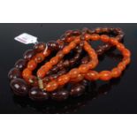 Two faux amber barrel bead long necklaces