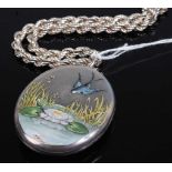 A continental white metal and enamelled picture locket, the obverse enamelled with a swallow
