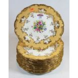 A collection of twelve Victorian dessert plates by Mintons, each having a central floral