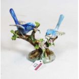 A Crown Staffordshire figure group of Australian Wrens, printed mark verso, designed and modelled by