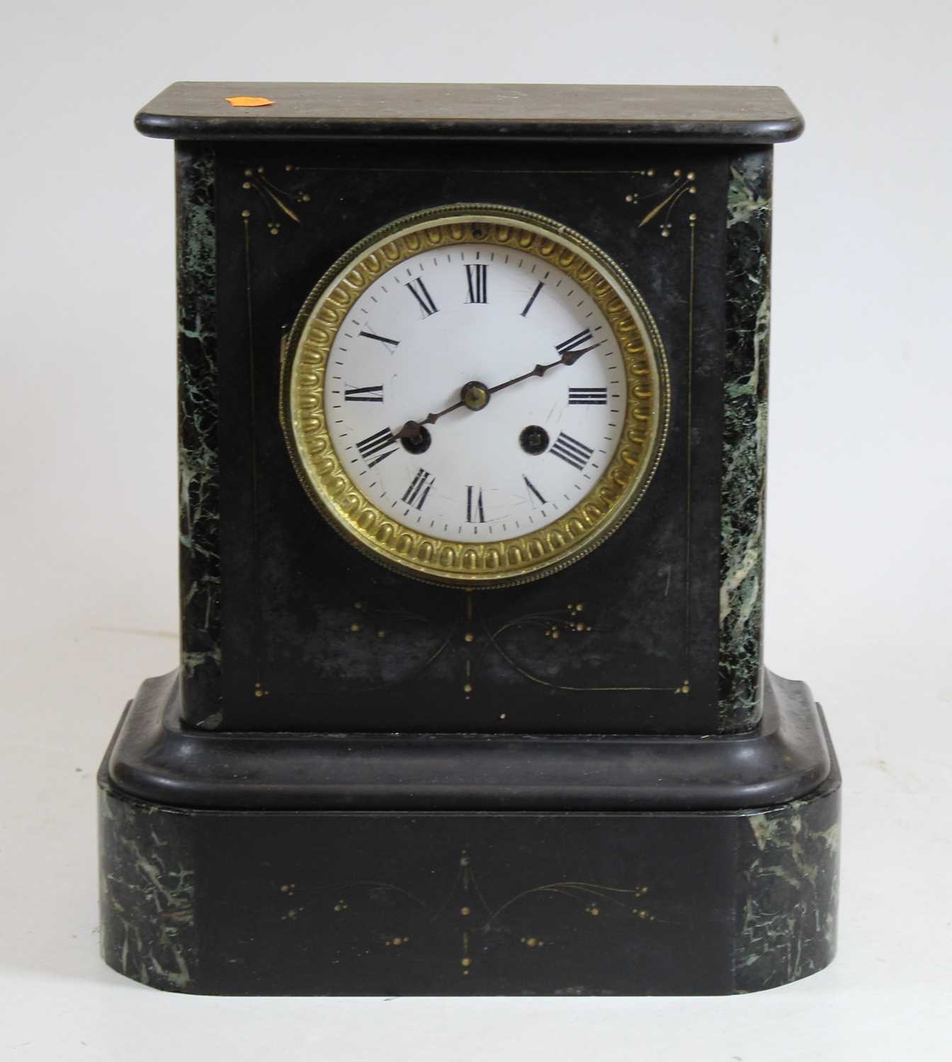 A Victorian black slate and serpentine marble 8 day mantel clock, H29cm
