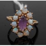 A 9ct gold, amethyst and opal set cluster ring, setting width 17mm, 3.7g, size M