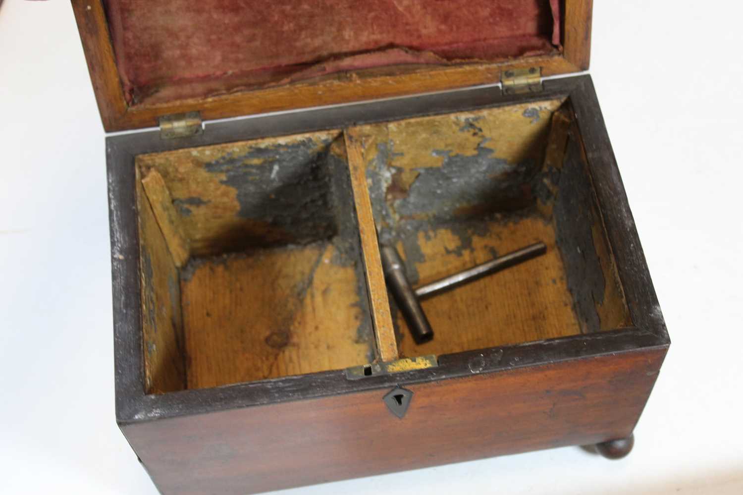A Regency mahogany tea caddy, of sarcophagus form with kite shaped escutcheons standing on four ball - Image 4 of 4